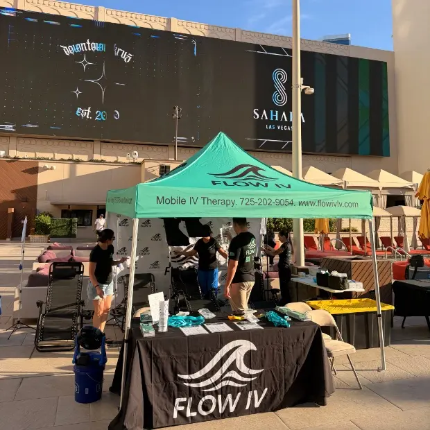 A Flow IV tent and branded table set up outside Sahara Las Vegas.